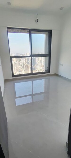 Room in 2 BHK Apartment at Dev Leo Tower, Oshiwara – for Rent