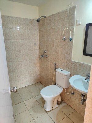 Bathroom in 3.5 BHK Apartment at Emaar Palm Gardens, Sector 83 – for Sale