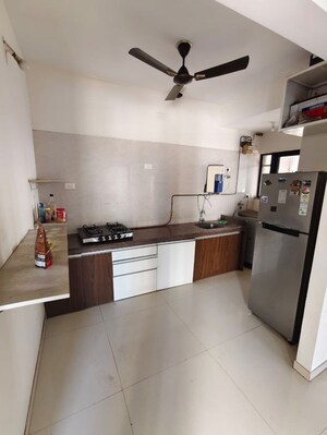 Kitchen in 2 BHK Apartment at Duville Riverdale Heights, Kharadi – for Rent