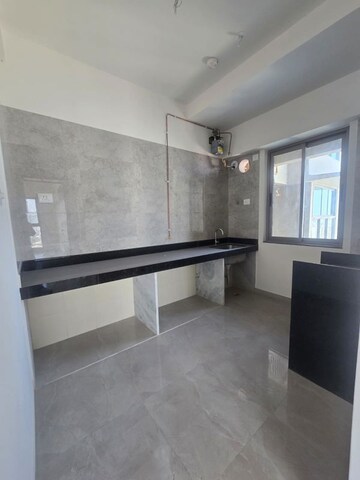 Kitchen in 2 BHK Apartment at Sheth Auris Bliss, Malad West – for Sale