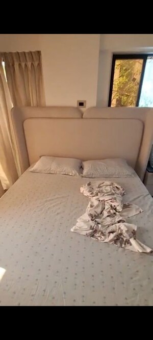 Bedroom in 2 BHK Apartment at Svarna Rosemary, Mahim West – for Rent