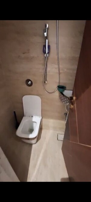 Bathroom in 2 BHK Apartment at Svarna Rosemary, Mahim West – for Rent