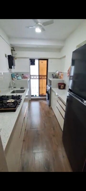 Kitchen in 2 BHK Apartment at Svarna Rosemary, Mahim West – for Rent