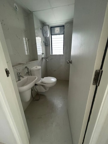 Bathroom in 2 BHK Apartment at Runwal Gardens, Dombivli East – for Rent