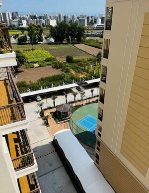 Balcony in 2 BHK Apartment at Affinity Greens, International Airport Road – for Rent
