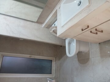 Bathroom in 2 BHK Apartment at Devika Skypers, Raj Nagar Extension – for Sale