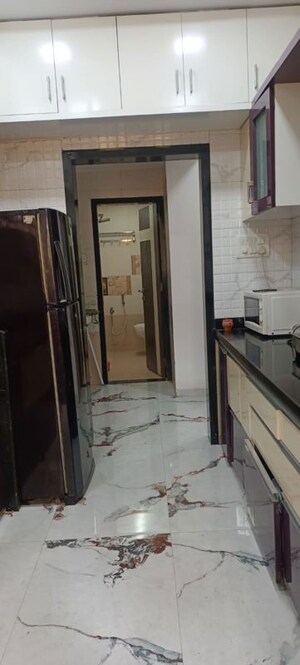 Kitchen in 2 BHK Apartment at Ravechi Heights, Kharghar – for Sale