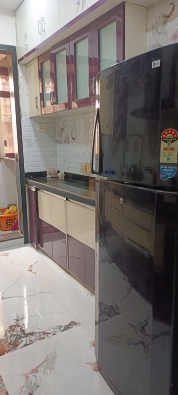 Kitchen in 2 BHK Apartment at Ravechi Heights, Kharghar – for Sale