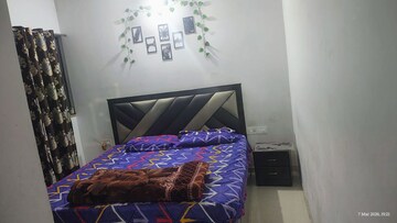 Bedroom in 2 BHK Apartment at Lodha Palava City, Dombivli East – for Rent