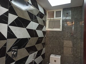 Bathroom in 4 BHK Builder Floor at Malviya Nagar – for Sale