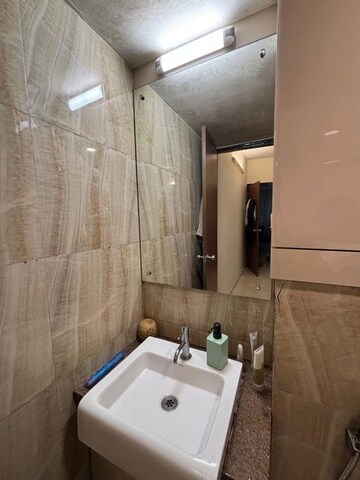 Bathroom in 2 BHK Apartment at Lodha Amara, Kolshet Road – for Rent