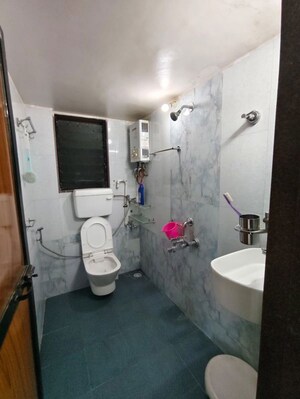 Bathroom in 2 BHK Apartment at Swastik Residency 1, Ghodbunder Road – for Rent