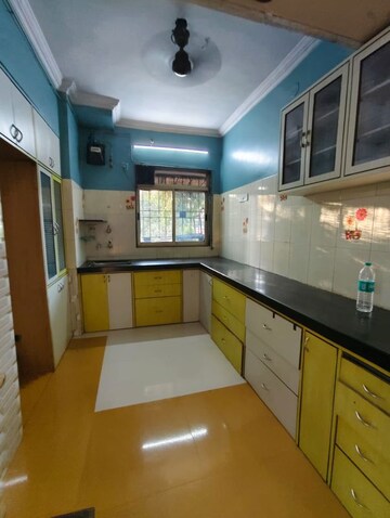 Kitchen in 2 BHK Apartment at Swastik Residency 1, Ghodbunder Road – for Rent