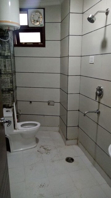 Bathroom in 3 BHK Builder Floor at Khirki Extension – for Sale