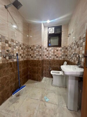 Bathroom in 2.5 BHK Builder Floor at Chattarpur – for Rent