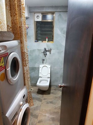 Bathroom in 2 BHK Apartment at Raunak Paradise, Kokanipada – for Rent