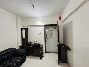 Living Room in 1 BHK Apartment at Anand Vishwaraj Residency, Wagholi – for Rent
