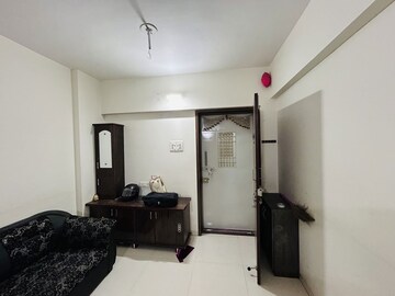 Living Room in 1 BHK Apartment at Anand Vishwaraj Residency, Wagholi – for Rent