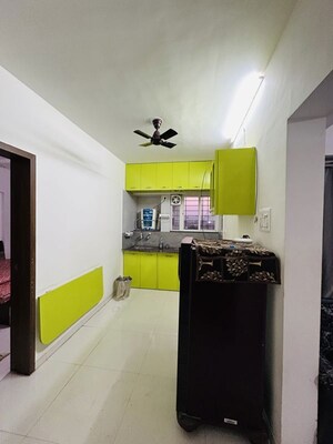 Kitchen in 1 BHK Apartment at Anand Vishwaraj Residency, Wagholi – for Rent