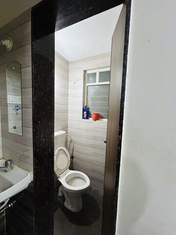 Bathroom in 1 BHK Apartment at Anand Vishwaraj Residency, Wagholi – for Rent