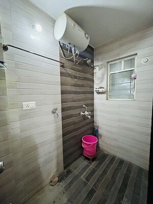 Bathroom in 1 BHK Apartment at Anand Vishwaraj Residency, Wagholi – for Rent