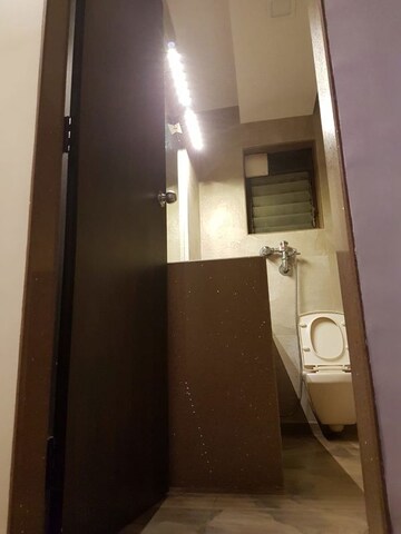 Bathroom in 2 BHK Apartment at Raunak Paradise, Kokanipada – for Rent