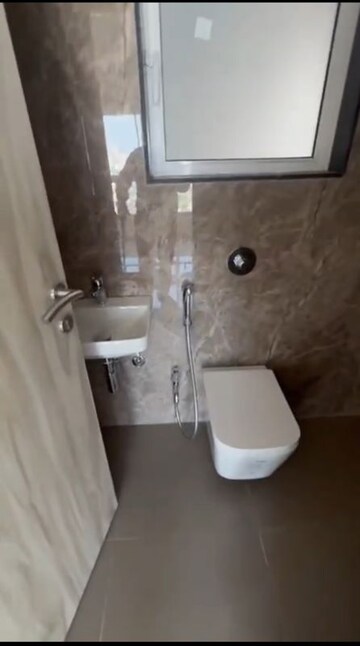 Bathroom in 1 BHK Apartment at Mahaveer Solitaire Edge, Kandivali East – for Rent