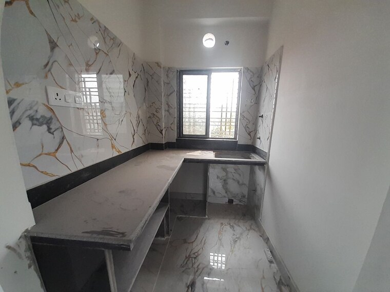 Kitchen, kaikhali 2 Bedroom 810 Sq.Ft. Apartment In Kaikhali Kolkata 10102394