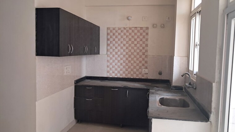 Kitchen, amrapali-princely-estate 2.5 Bedroom 1015 Sq.Ft. Apartment In Sector 76 Noida 10102406
