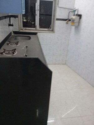 Kitchen in 1 BHK Apartment at Vasundhara Society, Andheri East – for Sale