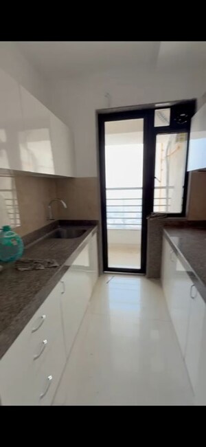 Kitchen in 3 BHK Apartment at Sunteck City Avenue 1, Goregaon West – for Rent