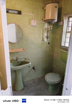 Bathroom in 1 BHK Apartment at Patil Raghukul Nagari CHS, Bopodi – for Rent