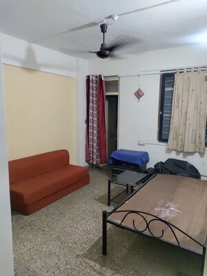 Living Room in 1 BHK Apartment at Patil Raghukul Nagari CHS, Bopodi – for Rent