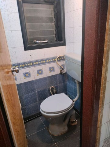 Bathroom in 1 BHK Apartment at Om Saidham Apartment, Vashi Sector 17 – for Rent