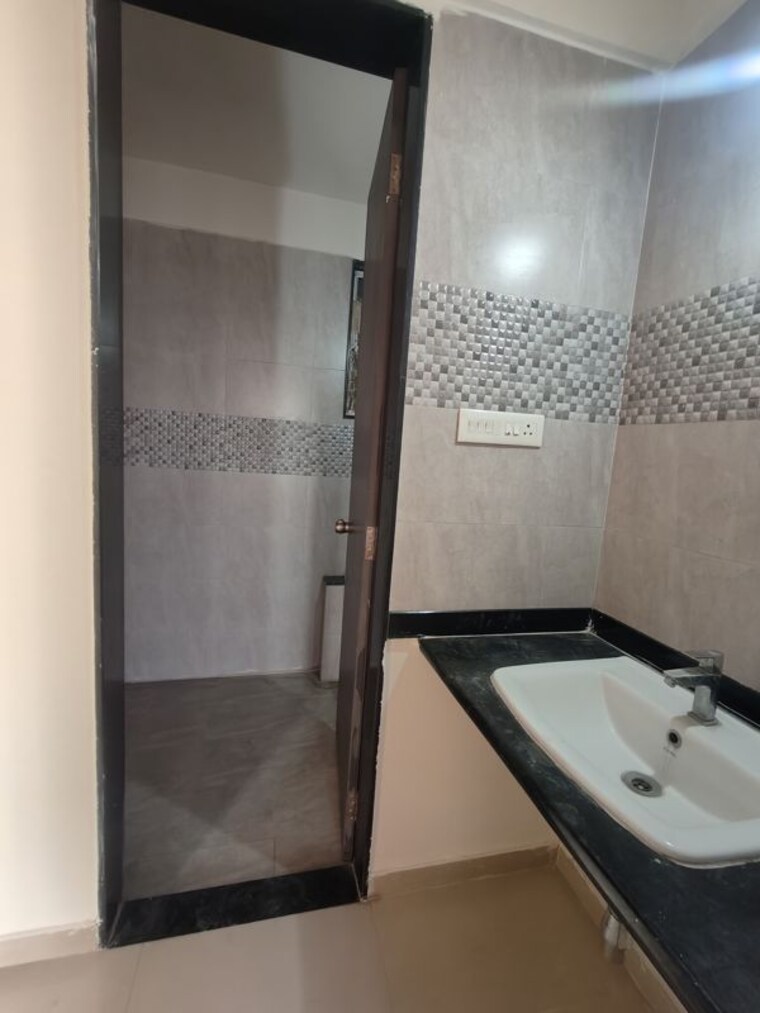 Bathroom, sai-ambience-sai-vision 2 Bedroom 989 Sq.Ft. Apartment In Pimple Saudagar Pune 10102685