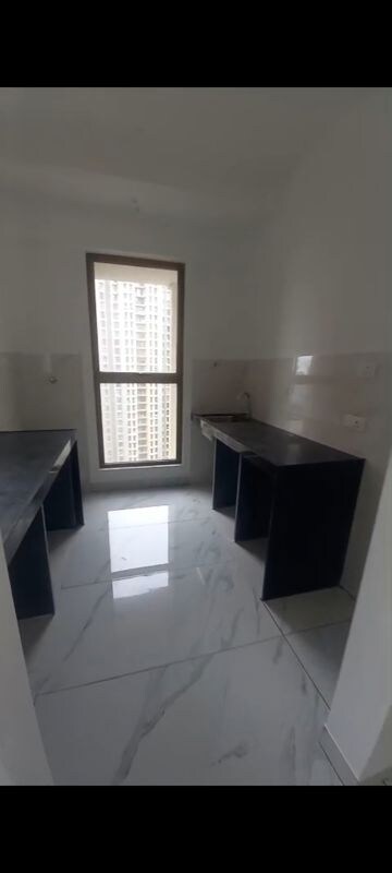 Kitchen in 1 BHK Apartment at Raymond Ten X Habitat, Pokhran Road No Two – for Rent