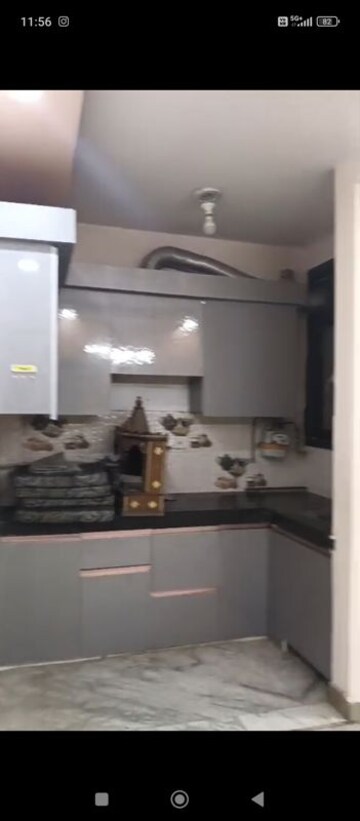 Kitchen in 2 BHK Apartment at Mohan Garden – for Sale