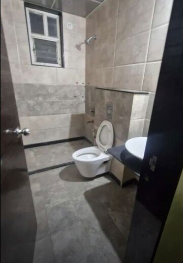 Bathroom in 2 BHK Apartment at Ganga Arcadia, Kharadi – for Rent
