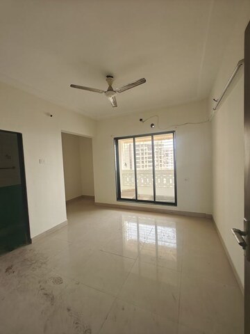Room in 2.5 BHK Apartment at Gahlot Majesty and Avenue CHS, Seawoods – for Sale