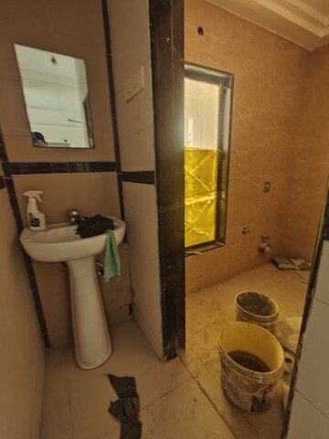 Bathroom in 2.5 BHK Apartment at Gahlot Majesty and Avenue CHS, Seawoods – for Sale