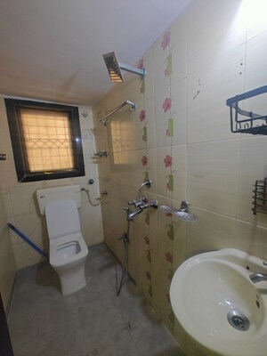 Bathroom in 2 BHK Apartment at Jay Vikram CHS, Seawoods – for Rent