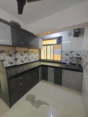 Kitchen in 2 BHK Apartment at Jay Vikram CHS, Seawoods – for Rent