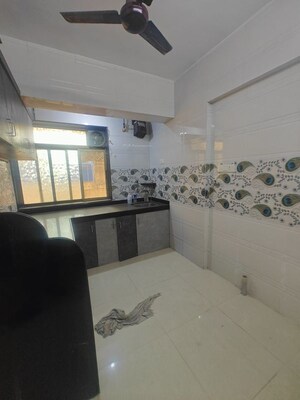 Kitchen in 2 BHK Apartment at Jay Vikram CHS, Seawoods – for Rent