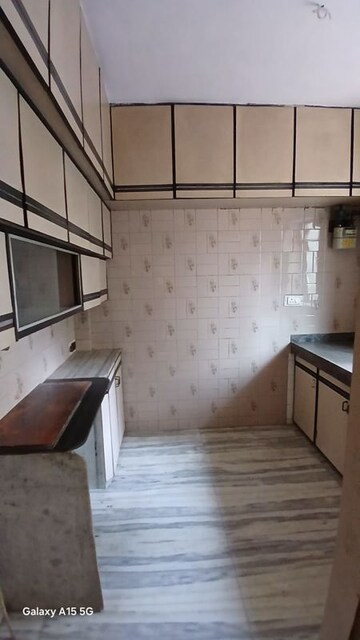 Kitchen in 1 BHK Apartment at Ekta Meadows, Borivali East – for Rent