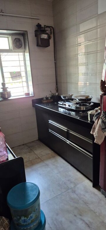 Kitchen in 1 BHK Apartment at Ekta Meadows, Borivali East – for Rent