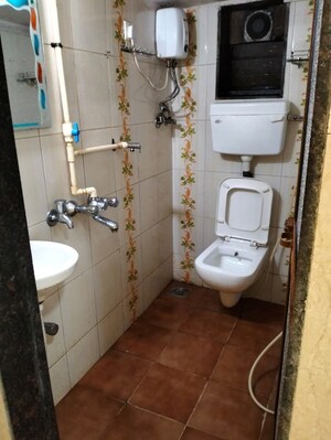Bathroom in 1 BHK Apartment at Ankur Society, Andheri East – for Rent