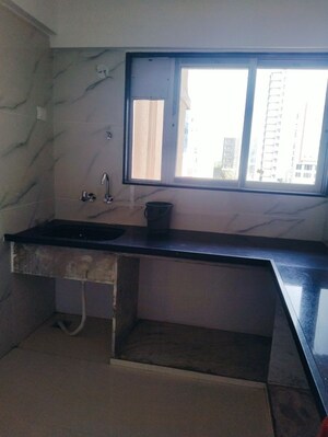 Kitchen in 2 BHK Apartment at Yash Ina Apartments, Goregaon West – for Sale