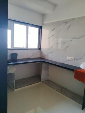Kitchen in 2 BHK Apartment at Yash Ina Apartments, Goregaon West – for Sale