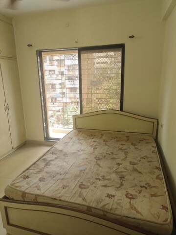 Bedroom in 2 BHK Apartment at Mudit Garden, Kopar Khairane – for Rent
