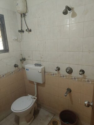 Bathroom in 2 BHK Apartment at Mudit Garden, Kopar Khairane – for Rent